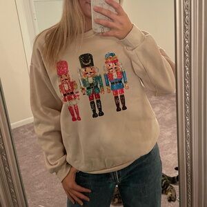 Nutcracker Graphic Christmas Sweatshirt – Size Medium – Cream